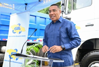 Prime Minister, Dr. the Most Hon. Andrew Holness, delivers the keynote address during a handover ceremony for 10 new tipper trucks presented to the National Solid Waste Management Authority (NSWMA). The ceremony was held at the NSWMA’s headquarters in Kingston on Tuesday (December 23).

