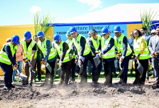 Prime Minister, Dr. the Most Hon. Andrew Holness (centre), participates in the breaking of ground for the US$50-million Tropical Sugar Company Limited in Chesterfield, Clarendon, on Tuesday (December 2).  He is joined by Minister of Agriculture, Fisheries and Mining, Hon. Floyd Green (third left); Chief Executive Officer (CEO) of Tropical Sugar Company Limited, Anil Jami (fourth left); Minister of Labour and Social Security and Member of Parliament for Clarendon South Eastern, Hon. Pearnel Charles Jr. (second right); Chief Executive Officer of Jamaica Promotions Corporation (JAMPRO), Shullette Cox, and other stakeholders. 

