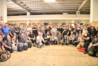 Canadian linesmen after arriving at Sangster International Airport in Montego Bay, St. James, on Wednesday (December 18) to support Jamaica’s electricity restoration efforts following Hurricane Melissa.

