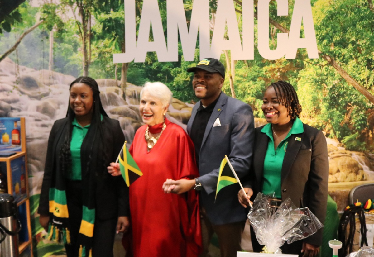 Organiser of the ‘Winternational’ global embassy showcase, Jan Du Plain (second left), shares a photo opportunity at Jamaica’s booth with members of staff from the Embassy of Jamaica in Washington, D.C. (from left) Counsellor, Brittany McCrea; Community Relations Officer, Emile Wallace Waddell; and Minister Counsellor for Trade, Alicia Taylor. The event was held recently at the Ronald Reagan Building and International Trade Center in downtown Washington, D.C.

