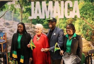 Organiser of the ‘Winternational’ global embassy showcase, Jan Du Plain (second left), shares a photo opportunity at Jamaica’s booth with members of staff from the Embassy of Jamaica in Washington, D.C. (from left) Counsellor, Brittany McCrea; Community Relations Officer, Emile Wallace Waddell; and Minister Counsellor for Trade, Alicia Taylor. The event was held recently at the Ronald Reagan Building and International Trade Center in downtown Washington, D.C.

