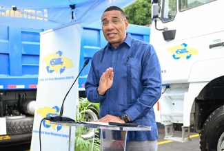 Prime Minister, Dr. the Most Hon. Andrew Holness, delivers the keynote address during a handover ceremony for 10 new tipper trucks presented to the National Solid Waste Management Authority (NSWMA). The ceremony was held at the NSWMA’s headquarters in Kingston on Tuesday (December 23).

