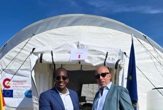 Honourable Alando Terrelonge, State Minister in the Ministry of Foreign Affairs and Foreign Trade of Jamaica, and His Excellency José María Fernández López de Turiso, Ambassador of Spain to Jamaica, are pictured shaking hands outside one of the tents of the field hospital in Falmouth deployed by the Government of Spain.