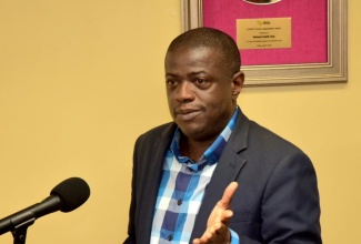 Chief Executive Officer of the National Health Fund (NHF), Everton Anderson, addresses the recent handover of medications and vitamins valued at over US$200,000, donated by Dr. Reddy’s Laboratories in support of Jamaica's hurricane relief efforts, at the NHF offices in New Kingston.

