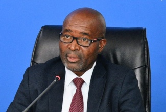 Chief Executive Officer, Rural Agricultural Development Authority (RADA), Garnet Edmondson (third left), addressing RADA’s Recovery and Resilience Forum held at the offices of the Ministry of Agriculture, Fisheries and Mining at Hope Gardens, St. Andrew, on Monday (December 1).

