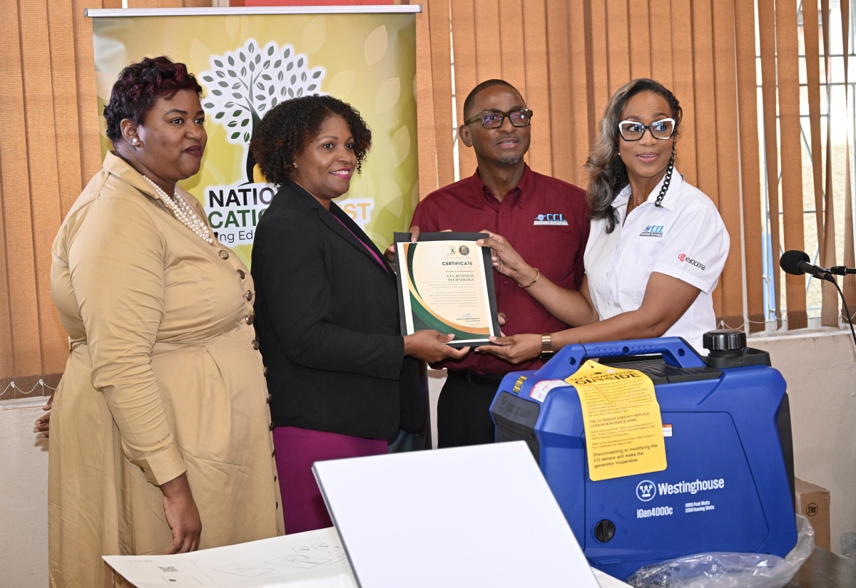 National Education Trust (NET) Executive Director, Latoya Harris‑Ghartey (second left), presents a certificate of appreciation to CCL Business Technology Limited Chief Executive Officer, Wayne Brown, and Managing Director, Karen Felicien‑Brown, during Tuesday’s (December 16) handover ceremony at Caenwood Centre, Kingston. The company, in collaboration with Kyocera Document Solutions America, donated 10 generators and five Starlink units to schools in western Jamaica. At left is Assistant Chief Education Officer, Daynea Facey

