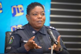 Head of the Constabulary Communications Network (CCN), Senior Superintendent of Police Dahlia Garrick, speaks during a Jamaica Information Service (JIS) ‘Think Tank’ on December 8 about the Jamaica Constabulary Force (JCF) Christmas through its Children’s Advocacy, Recovery and Empowerment (CARE) Initiative.