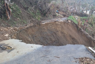Motorcyclists and pedestrians urged to avoid a dangerous breakaway along the Spring Mount road in St. James that was caused by the recent passage of Hurricane Melissa.