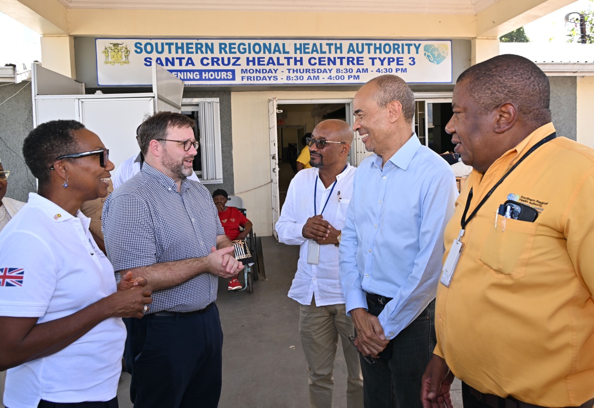 United Kingdom (UK) Minister for the Caribbean, Chris Elmore (second left), shares in discussion with (from left) UK High Commissioner to Jamaica, Her Excellency, Alicia Herbert; Parish Manager for St. Elizabeth Health Services, Sean Brissett; Chairman of the Southern Regional Health Authority (SRHA), Wayne Chen; and Regional Director at the SRHA, Michael Bent. Occasion was a tour of the Santa Cruz Health Centre in St. Elizabeth on Tuesday (December 2) by Mr. Elmore, during his recent visit to the island.

