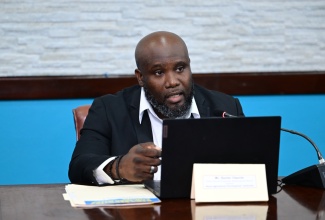 Senior Director for Production, Marketing and Special Projects, Rural Agricultural Development Authority (RADA), Xavier Charvis,  addresses the second of  four RADA Recovery & Resilience Stakeholder sessions, held at the offices of the Ministry of Agriculture,  Fisheries and Mining at Hope Gardens, on December  8. 

