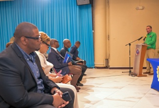 Minister of Energy, Transport and Telecommunications, Hon. Daryl Vaz, responds to questions posed during a press conference to provide details on the steps to accelerate restoration of electricity by the JPS, at the PCJ Building in New Kingston, on December 16.

