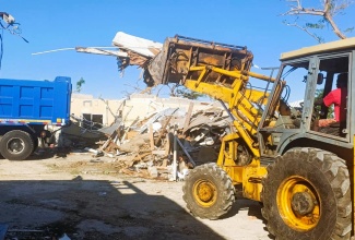 Clean-up operations under way in Black River, St. Elizabeth, on Monday (December 29), following the devastation caused by Hurricane Melissa. 

