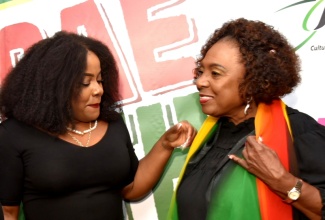 Minister of Culture, Gender, Entertainment and Sport, Hon. Olivia Grange (right) shares a moment with 2026 Reggae Month Ambassador, Etana at the official launch for Reggae Month at the J. Wray and Nephew corporate office in New Kingston on January 21.
