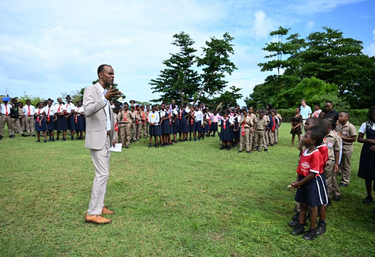 Principal of Seaside Primary School, Adli Lewis, addresses students during an earthquake drill held at the institution on January 14 as part of National School Earthquake Drill Day activities.
