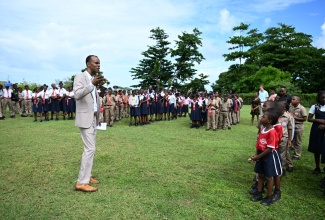 Principal of Seaside Primary School, Adli Lewis, addresses students during an earthquake drill held at the institution on January 14 as part of National School Earthquake Drill Day activities.