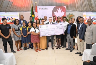 High Commissioner of Canada to Jamaica, His Excellency Mark Berman (centre), is pictured with representatives of nine community‑based organisations receiving grants under the Canada Fund for Local Initiatives (CFLI) during a Spotlight Event, held at the Terra Nova All-Suite Hotel in St. Andrew on Thursday (January 22).

