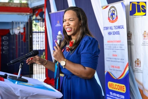 Permanent Secretary in the Ministry of Education, Skills, Youth and Information, Dr. Kasan Troupe, delivers the keynote address during the official opening of the Electronic Document Preparation and Management (EDPM) and Customer Engagement Laboratory at Stony Hill Technical High School in St. Andrew on Friday (January 9).