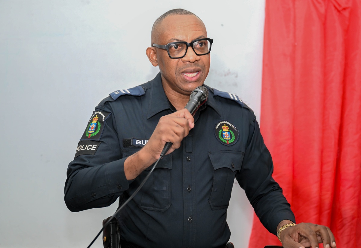  Inspector Donald Burke of the Jamaica Constabulary Force (JCF), Bath Division, speaks at a community forum at the Bath Primary School in St. Thomas, on January 28.