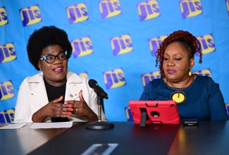 Principal Probation Aftercare Officer in the Department of Correctional Services, Kerryann Davis (left), and Technical Specialist for Socio-Economic Development in the Community Renewal Programme at the Planning Institute of Jamaica (PIOJ), Charmaine Brimm, participate in a Jamaica Information Service Think Tank on January 12.

