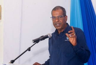 Chief Executive Officer of the National Fisheries Authority (NFA), Dr. Gavin Bellamy delivers remarks at the National Tilapia Farmers’ Consultation held on Thursday (January 22) at the Caymanas Golf and Polo Resort in St. Catherine. 
