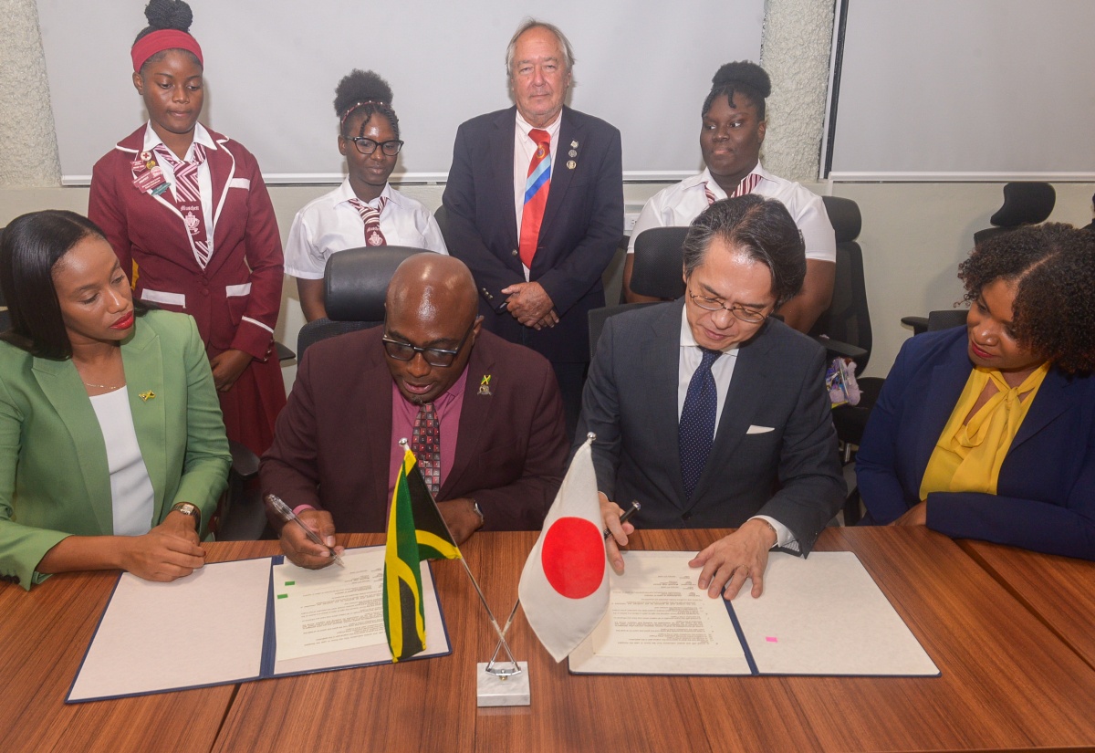 Japan Donates Two School Buses to Muschette High