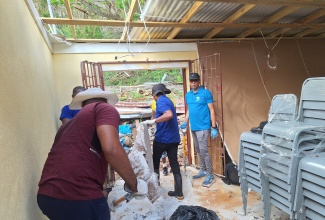 Ministry of Education, Skills, Youth and Information leading clean-up efforts at several hurricane-affected schools in western parishes.

