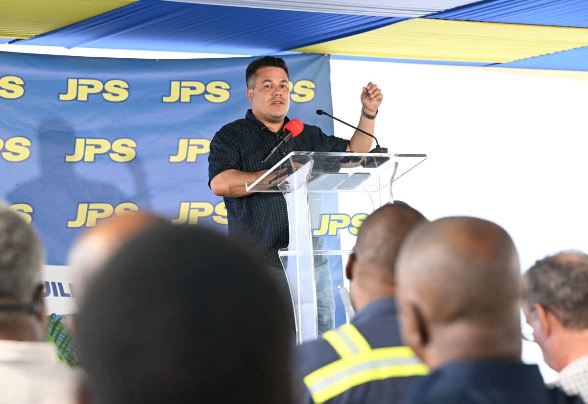 Minister of Water, Environment and Climate Change, Hon. Matthew Samuda, addresses the official commissioning of a 500-kilowatt emergency mobile power generation unit in Darliston, Westmoreland, on Sunday (January 25).

