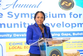 Senior Research Fellow at the Sir Arthur Lewis Institute of Social and Economic Studies (SALISES), University of the West Indies (UWI), Mona, Dr. Dacia Leslie, addresses day one of the 10th Planning Institute of Jamaica (PIOJ) Best Practice Symposium on Tuesday (January 27), at The Jamaica Pegasus hotel in New Kingston. She was presenting on the theme 'Reintegration for Sustainable Development: Bridging Gaps and Building Futures'. 

