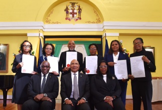 Governor-General, His Excellency the Most Hon. Sir Patrick Allen (seated centre); Chief Justice, Hon. Bryan Sykes (seated left), and President, Court of Appeal, Hon. Justice Marva McDonald Bishop (seated right), share a photo opportunity with the six members of the judiciary who were sworn in to higher office, during a ceremony at King’s House on January 5.


