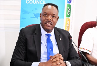 Caribbean Examinations Council (CXC) Registrar and Chief Executive Officer, Dr. Wayne Wesley, addresses Wednesday’s (January 7) CXC press conference, held at the Overseas Examinations Commission (OEC) in Kingston.