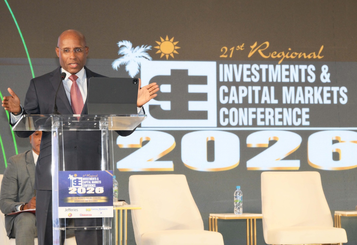 Minister of Industry, Investment and Commerce, Senator the Hon. Aubyn Hill, addresses the 21st Jamaica Stock Exchange (JSE) Regional Investment and Capital Markets Conference, held recently at The Jamaica Pegasus hotel in New Kingston

