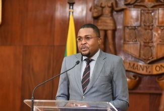 Minister with Responsibility for Works in the Ministry of Economic Growth and Infrastructure Development, Hon. Robert Morgan, addresses a recent post-Cabinet Press Briefing at Jamaica House.

