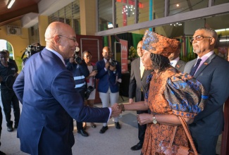 Governor General, His Excellency the Most Hon. Sir Patrick Allen (left), is greeted by Chairman of the National Leadership Prayer Breakfast Committee (NLPBC), Pastor Claudia Ferguson, on arrival at the Boulevard Baptist Church in St. Andrew on Thursday (January 15), for the 46th Annual National Leadership Prayer Breakfast.