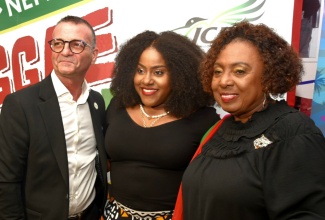 Minister of Culture, Gender, Entertainment and Sport, Hon. Olivia Grange (right), is joined by inaugural Reggae Month Ambassador and Recording Artiste, Etana (centre),and Managing Director of J. Wray and Nephew Limited, Daniel Caron, at the official launch for Reggae Month 2026, at the J. Wray and Nephew corporate office in New Kingston, on January 21.

