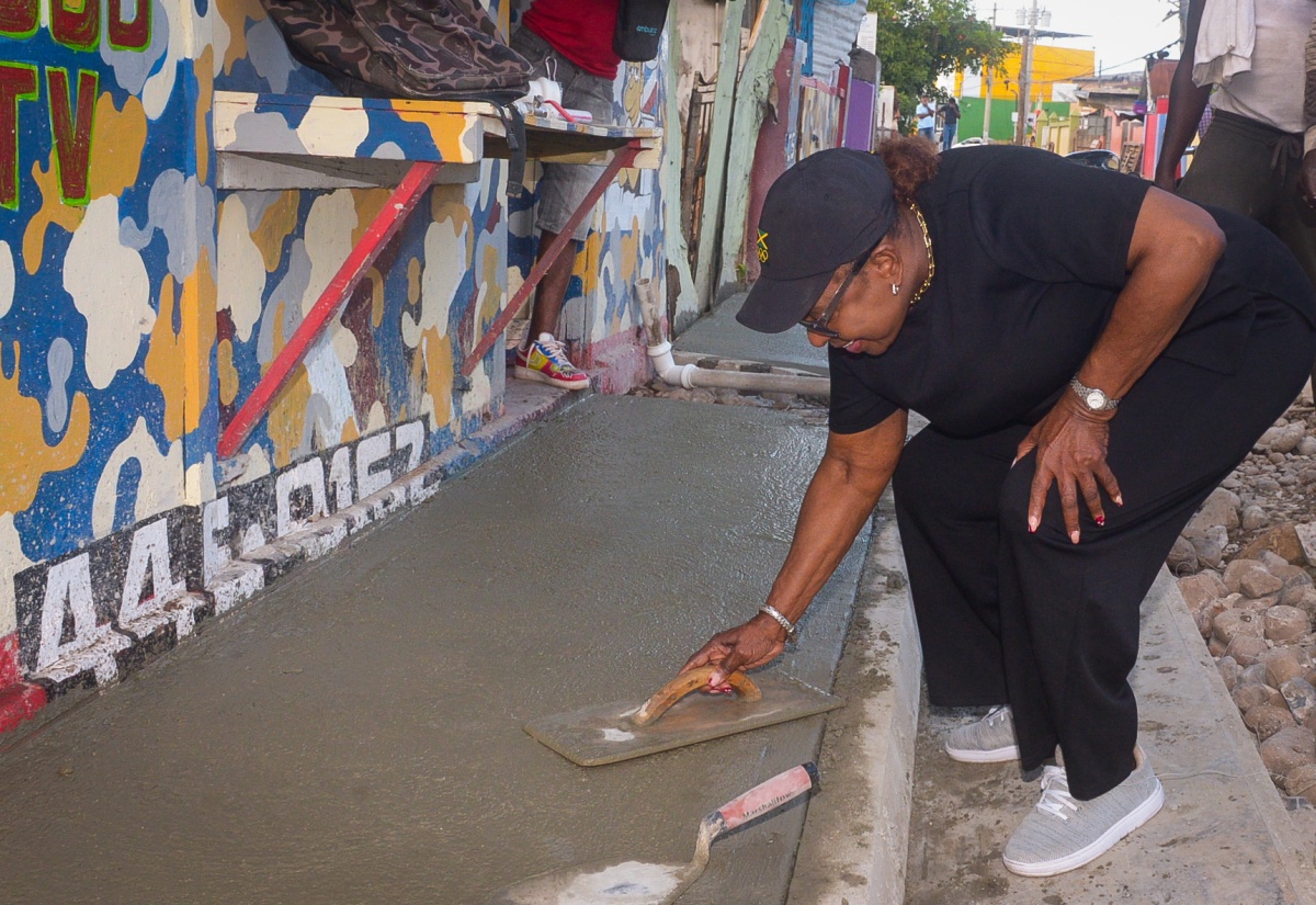 PHOTOS: Minister Grange Tours Roadworks Under SPARK