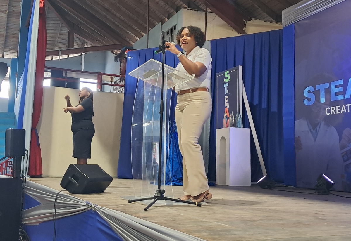 Executive Director of the National Education Trust (NET), Latoya Harris Ghartey, delivers remarks during the STEAM (Science, Technology, Engineering, Arts and Mathematics) In Action Expo, held on Thursday (January 29) at the Chinese Benevolent Association in St. Andrew.

