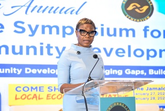 Minister of State in the Ministry of National Security and Peace, Hon. Juliet Cuthbert Flynn, delivers remarks during the opening ceremony for 10th staging of the Planning Institute of Jamaica (PIOJ) National Symposium of Best Practices for Social and Community Development on Tuesday (January 27). The event is being held at The Jamaica Pegasus hotel in New Kingston.

