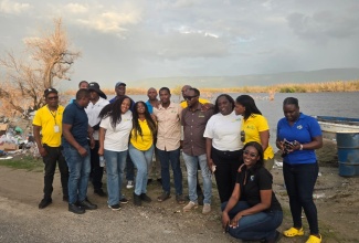 The combined team that distributed care packages in communities in St. Elizabeth, on January 22. They are  from Croydon Black Minority Ethnic (BME) Forum and the Coconut Industry Board (CIB).


