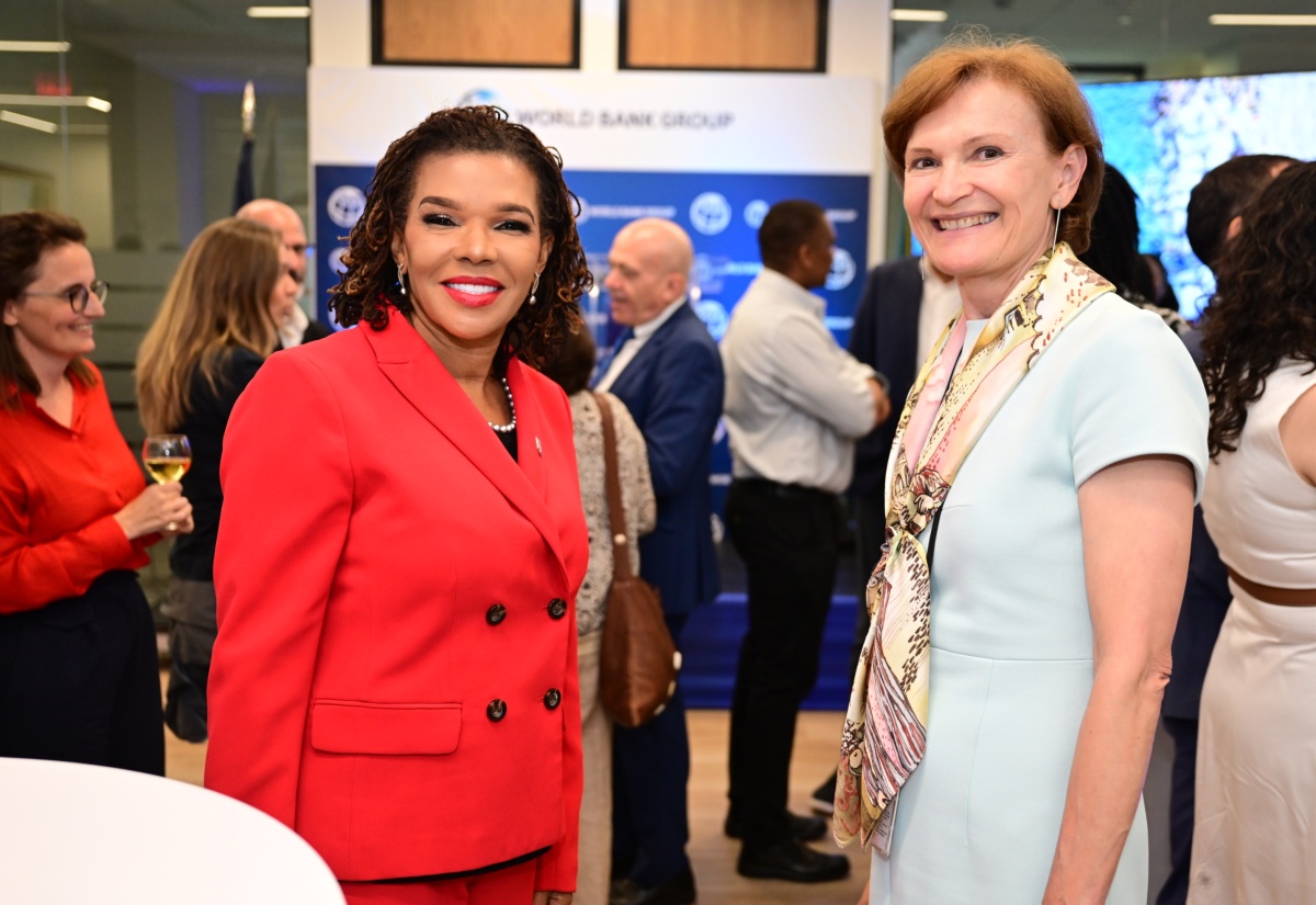 Minister without Portfolio in the Office of the Prime Minister with responsibility for Efficiency, Innovation and Digital Transformation, the Hon. Ambassador Audrey Marks (left), shares a photo with World Bank Director for Caribbean Countries, Lilia Burunciuc, during the official opening of the World Bank