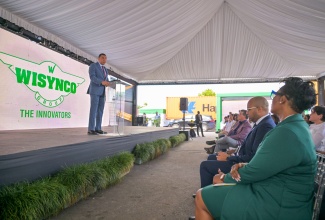 Prime Minister, Dr. the Most Hon. Andrew Holness, addresses the official opening of Wisynco Group’s Devon H. Reynolds Brewery and Manufacturing Facility in Lakes Pen, St Catherine, on Tuesday (January 13). 

