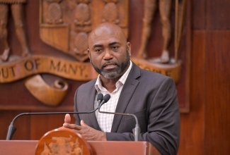 Minister Without Portfolio in the Office of the Prime Minister with responsibility for Science, Technology and Special Projects, Dr. the Hon. Andrew Wheatley, addresses the post-Cabinet press briefing held January 14 at Jamaica House.

