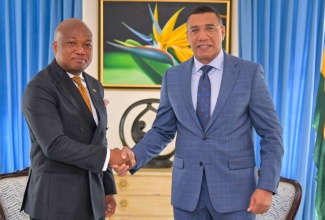 Prime Minister, Dr. the Most Hon. Andrew Holness (right), greets the Republic of Ghana’s Minister of Foreign Affairs, Hon. Samuel Okudzeto Ablakwa, during a courtesy call at Jamaica House on Monday (January 26).


