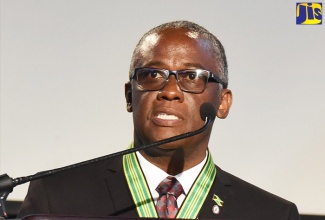 Custos of Manchester, Hon. Garfield Green.