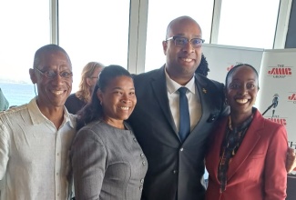 Minister of State in the Ministry of Industry, Investment and Commerce, Hon. Delano Seiveright (second right), is flanked by (from left) President of the Jamaica Hotel and Tourist Association (JHTA) Christopher Jarrett; President of the Montego Bay Chapter of the JHTA and Royalton Resorts Executive, Kerry Ann Quallo Casserly, and Montego Bay businesswoman and Montego Bay Chamber of Commerce Director, Nadine Spence, at the Jamaica Money Market Brokers (JMMB) business breakfast, in Montego Bay, on January 28.

