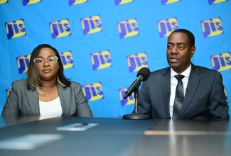 Acting Chief Judge of the Parish Courts, His Honour Broderick Smith, and Court Administration Division (CAD) Director of Client Services, Communications and Information, Kadiesh Jarrett-Fletcher, at a Jamaica Information Service (JIS) Think Tank on February 16.

