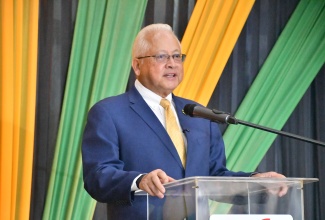 Minister of Justice and Constitutional Affairs, Hon. Delroy Chuck, delivers the keynote address during the Commissioning Ceremony for Justices of the Peace in St. James at the Grand-A-View Event Place on January 30.