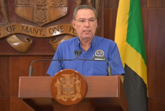 Minister of Energy, Transport and Telecommunications, Hon. Daryl Vaz, addresses a recent post-Cabinet press briefing at Jamaica House.

