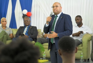 State Minister in the Ministry of Industry, Investment and Commerce, Hon. Delano Seiveright, addresses the University of the West Indies (UWI) Pelican Pitch Series on February 12 at the Mona campus in St. Andrew.

