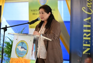 North-East Regional Health Authority (NERHA) Board Chair, Laura Heron, delivers remarks during the handover ceremony for the newly renovated Oxford Community Health Centre in St. Mary on February 13.