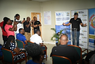 Health and Wellness Minister, Dr. the Hon. Christopher Tufton, addresses a media briefing held at the Western Regional Health Authority (WRHA) Technical Office at the Freeport Business Centre in St. James on February 7.